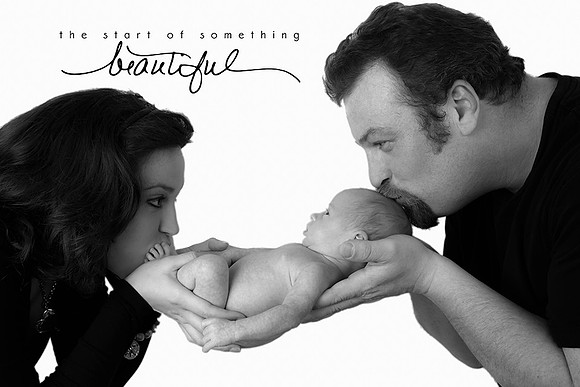 New parents showing love to new baby boy